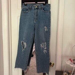 Distressed medium wash jeans size 12 /31